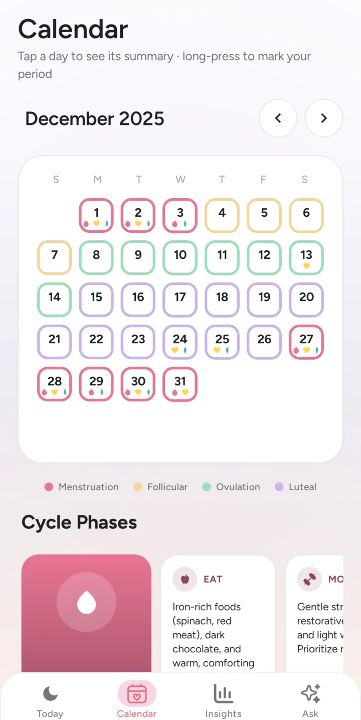 Calendar in light mode — phase-colored month grid